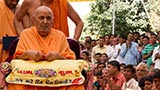  Swamishri holds a lamp in his hand on the occasion of Diwali