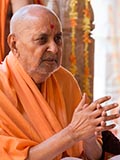  Swamishri engrossed in darshan of annakut