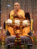  Senior sadhus honor Swamishri with a garland