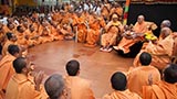  Sadhus and devotees perform arti