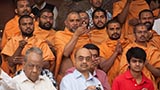  Sadhus and devotees perform arti