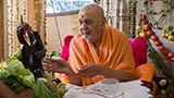  Swamishri holding various fruits and vegetables offered to Thakorji