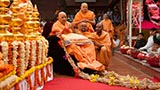  Senior sadhus honor Swamishri with a garland