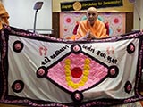  Sadhus honor Swamishri with a shawl