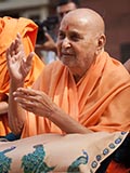  Swamishri blesses a devotee