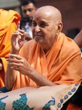  Swamishri blesses a devotee
