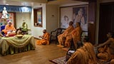  Sadhus sing kirtans while Swamishri performs his morning puja