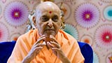 Swamishri in a divine, jovial mood
