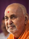 Swamishri in a divine, jovial mood