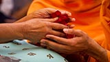 Swamishri sanctifies flowers for students