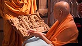  Swamishri sanctifies a wooden carving