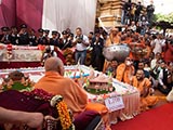  A percussion maestro plays drums before Swamishri