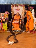  Sadhus honor Swamishri with garlands