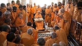  Swamishri with sadhus beneath the mandir dome