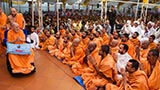  Sadhus and devotees doing darshan of Swamishri