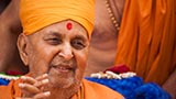 Swamishri in a divine, jovial mood