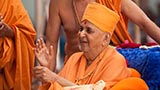 Swamishri in a divine, jovial mood