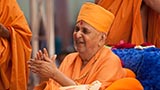 Swamishri in a divine, jovial mood