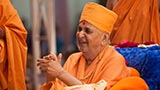 Swamishri in a divine, jovial mood