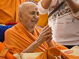 Swamishri in a divine, jovial mood