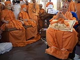 Swamishri with sadhus under the mandir dome