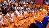 Sadhus and devotees doing darshan of Swamishri