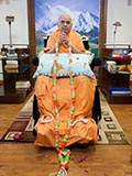  Swamishri is honored with a garland