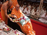  Swamishri sanctifies yantras to be placed beneath the shilas for Dhule Mandir