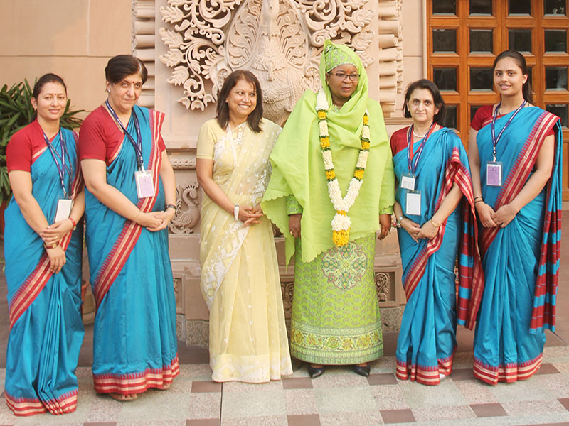 First Lady Salma Kikwete with Akshardham volunteers