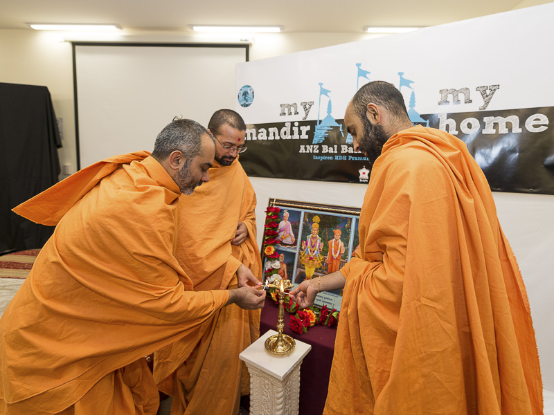 Sadhus lighting the inaugural lamp for Bal-Balika Shibir, Melbourne