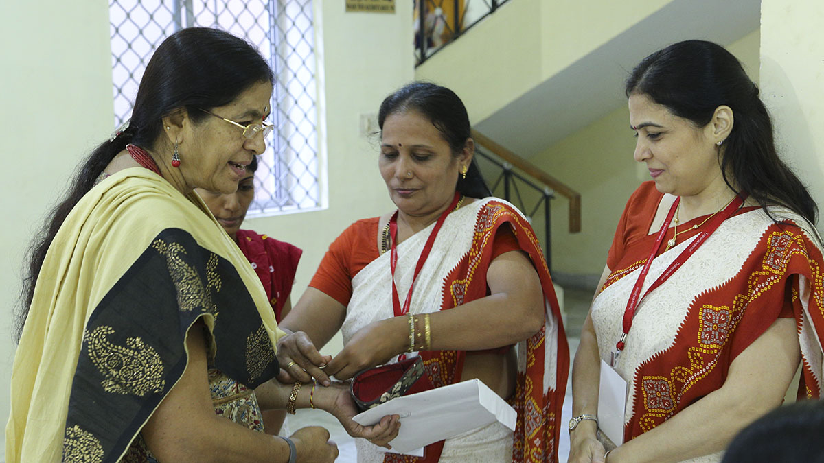 Guest are welcomed by tying nadachhadi, a sacred thread