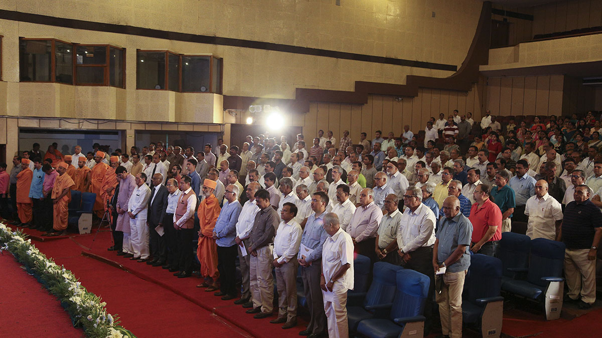 All guests stand to sing the Tamil Thai Valthu