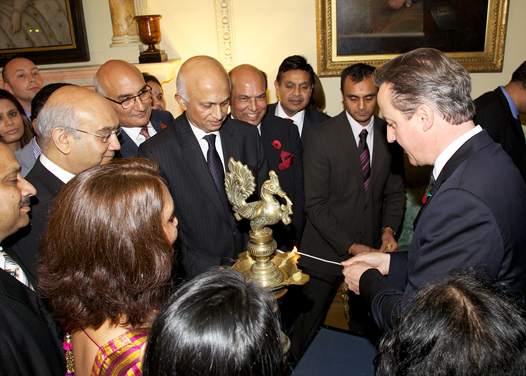 Prime Minister David Cameron lighting the lamp for the Diwali Celebrations at 10 Downing Street