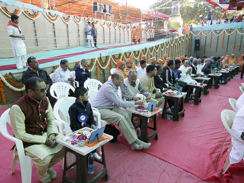 Devotees participate in mahapuja rituals