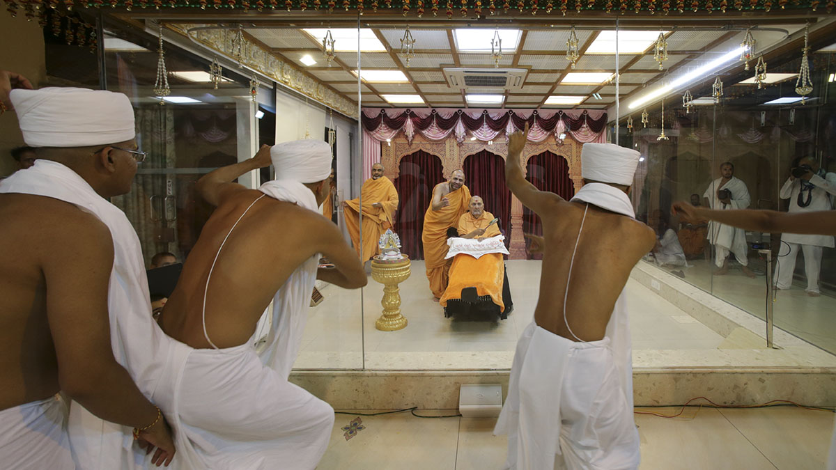 Newly initiated parshads rejoice in front of Swamishri