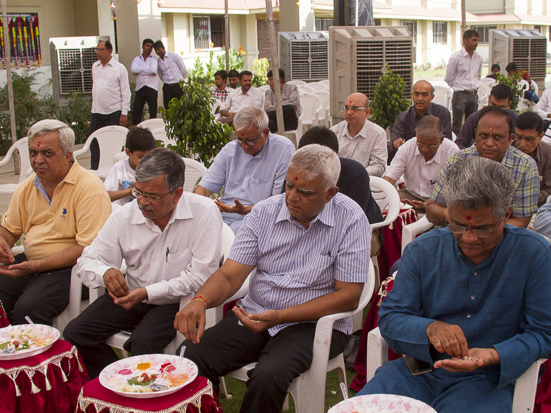 Devotees perform mahapuja rituals