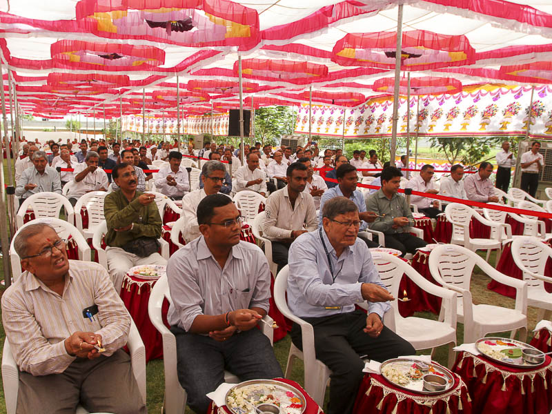 Devotees perform mahapuja arti
