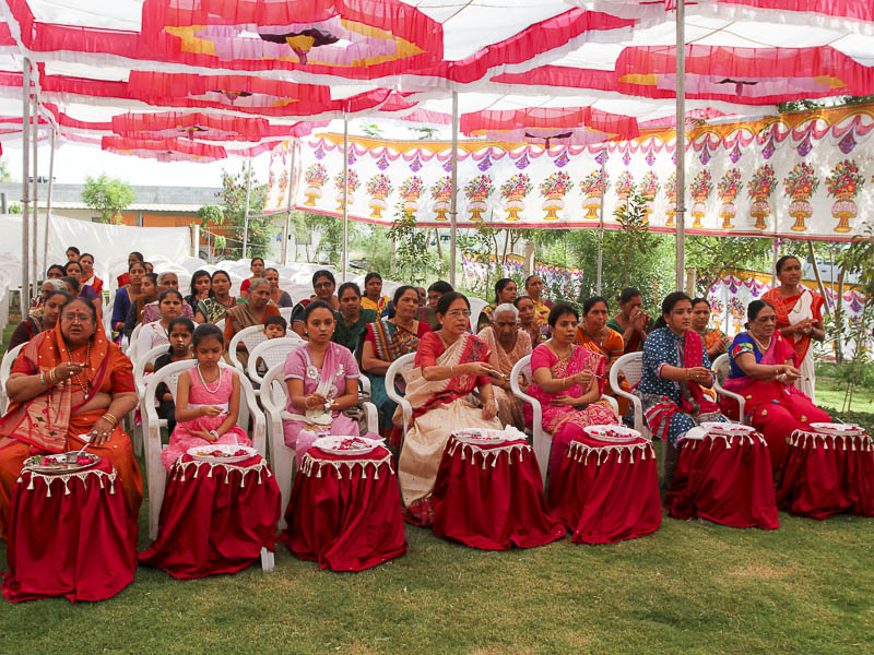 Devotees perform mahapuja arti