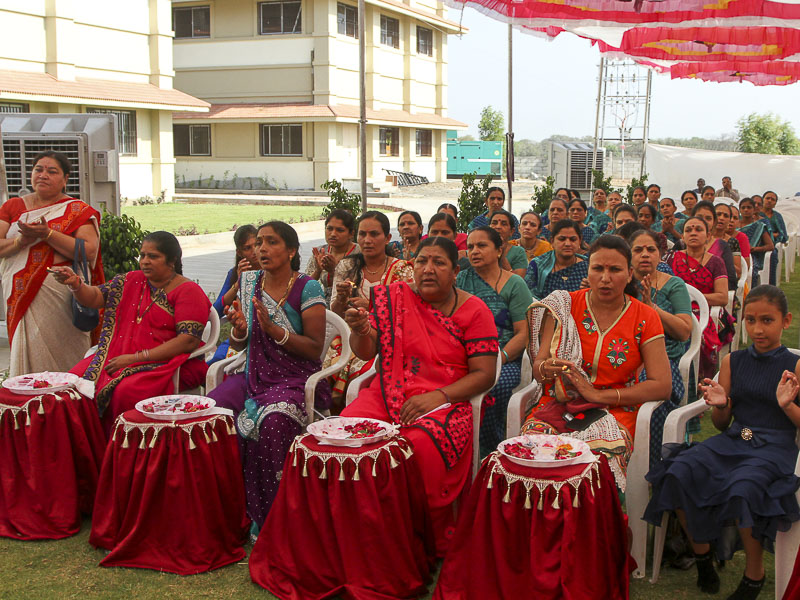 Devotees perform mahapuja arti