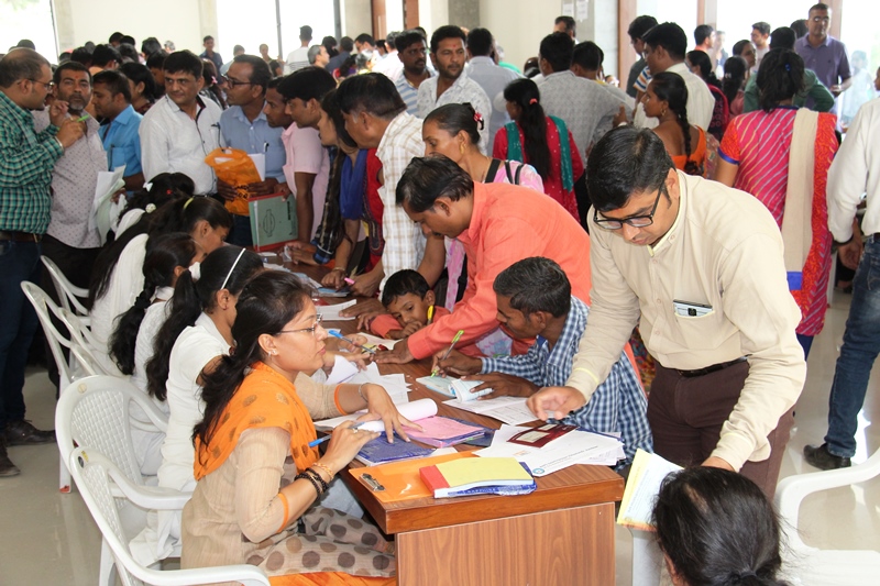 Parents being assisted for school admission process
