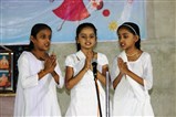 Students performing on stage