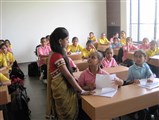 Students dressed as teachers and official staff with students