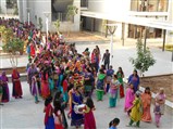 Maharaj and Swami sanctifying the campus as officials took turns to steer the charriot