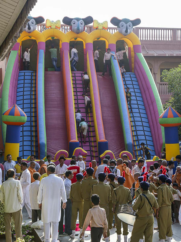 Children play on the bouncing castle, 18 Oct 2016