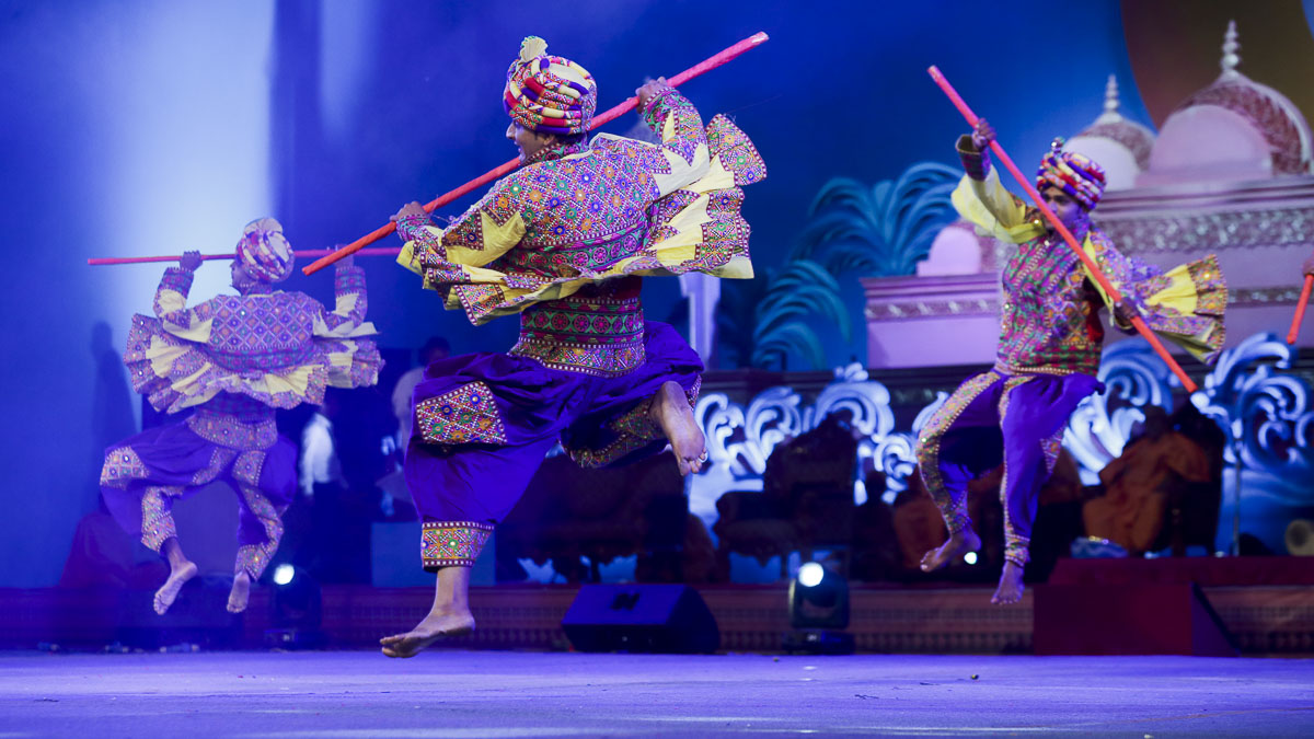 Children and youths perform a cultural dance
