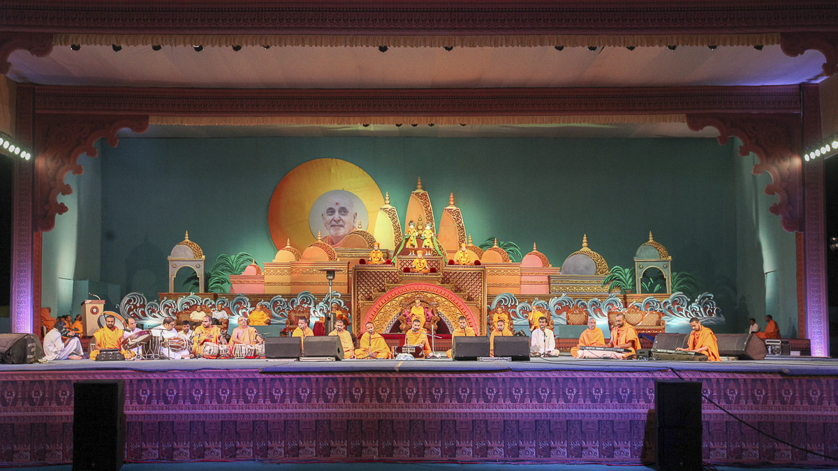 Sadhus present kirtan aradhana (program of devotional bhajans) in the evening satsang assembly