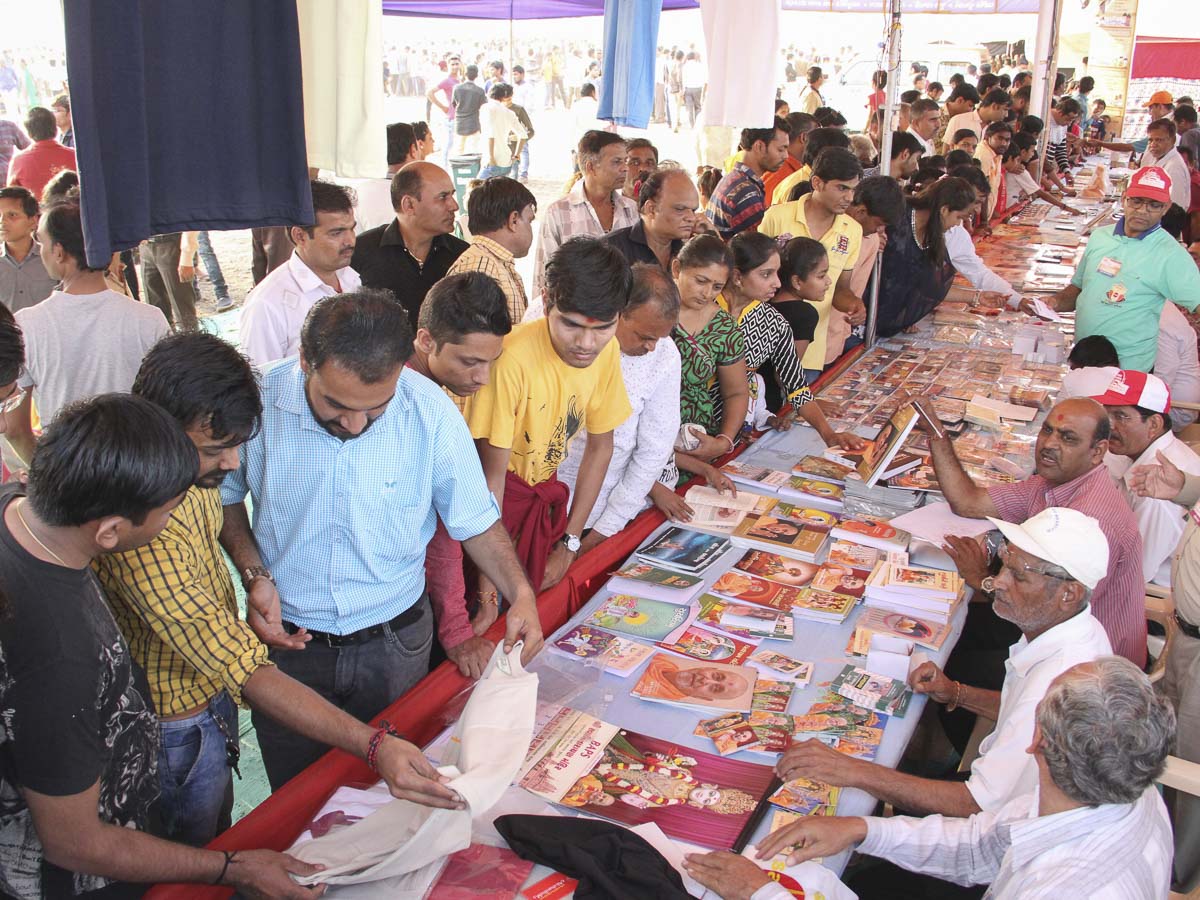 Devotees and well-wishers visit the book stall