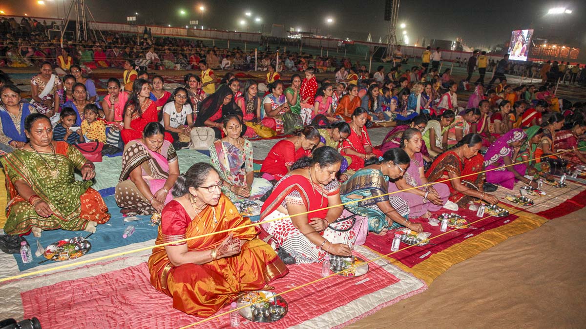 Mothers of the parshads participate in mahapuja rituals