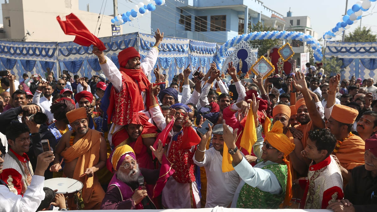 Devotees rejoice during the procession