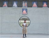 Students reading significance of Women